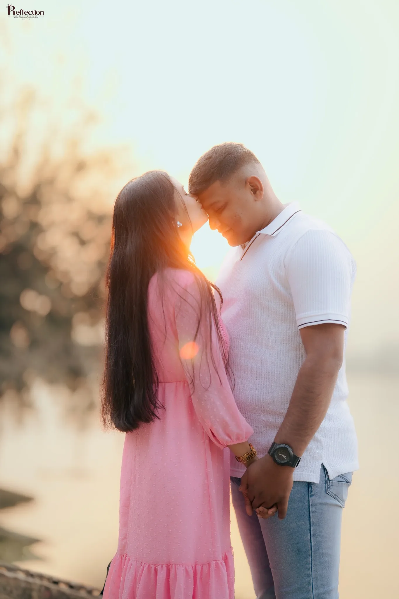 Couple sharing a quiet moment in warm sunset light